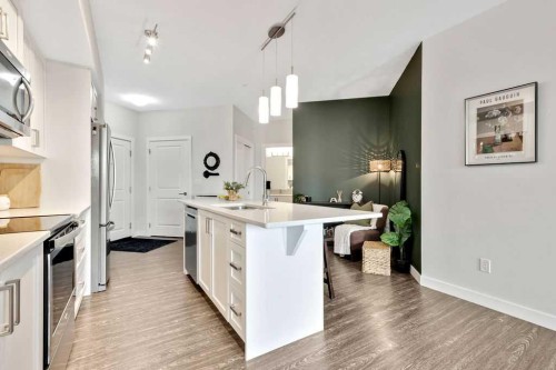 2310-3727 Sage Hill Drive Nw, Calgary, AB - Indoor Photo Showing Kitchen With Double Sink With Upgraded Kitchen