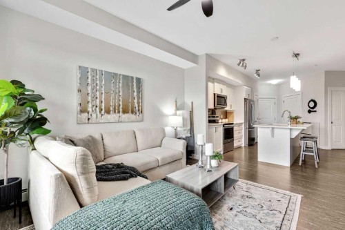 2310-3727 Sage Hill Drive Nw, Calgary, AB - Indoor Photo Showing Living Room