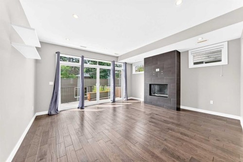 1317 20 Avenue Nw, Calgary, AB - Indoor With Fireplace