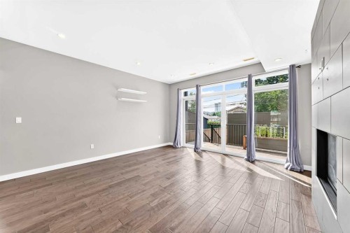1317 20 Avenue Nw, Calgary, AB - Indoor Photo Showing Other Room With Fireplace