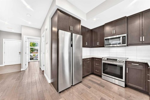 1317 20 Avenue Nw, Calgary, AB - Indoor Photo Showing Kitchen With Stainless Steel Kitchen
