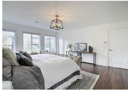 210 Panatella Heath Nw, Calgary, AB - Indoor Photo Showing Bedroom