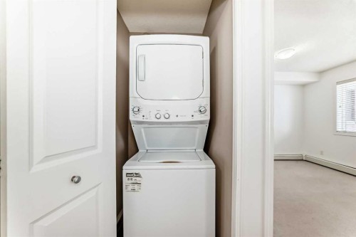 111-195 Kincora Glen Road Nw, Calgary, AB - Indoor Photo Showing Laundry Room