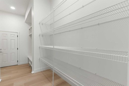 91 Heritage Manor, Cochrane, AB - Indoor With Storage
