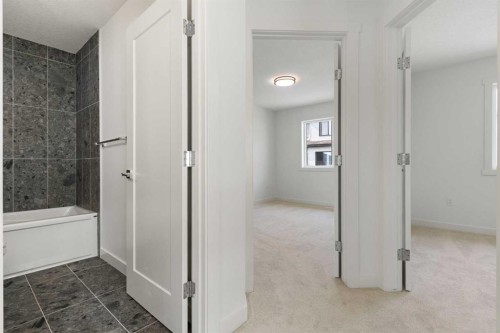 91 Heritage Manor, Cochrane, AB - Indoor Photo Showing Other Room
