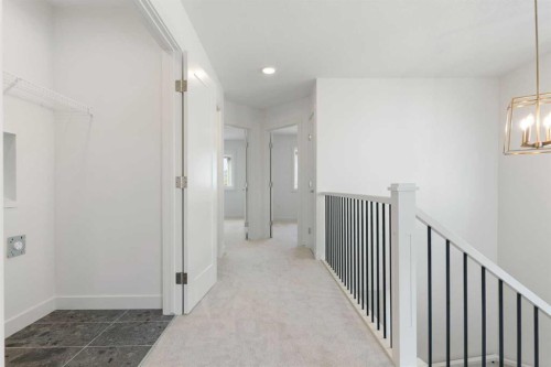 91 Heritage Manor, Cochrane, AB - Indoor Photo Showing Other Room