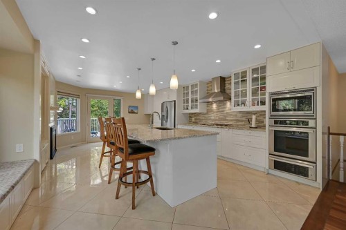 80 Edforth Way Nw, Calgary, AB - Indoor Photo Showing Kitchen With Upgraded Kitchen
