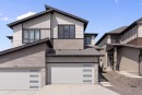 83 Heritage Manor, Cochrane, AB  - Outdoor With Exterior 