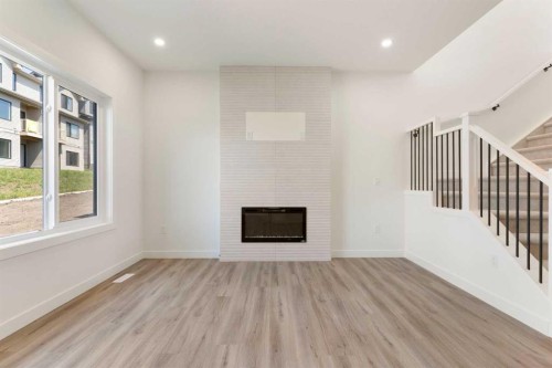 83 Heritage Manor, Cochrane, AB - Indoor Photo Showing Other Room