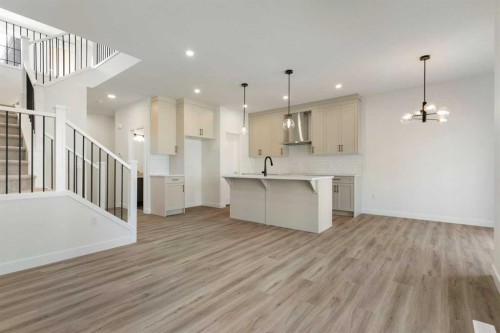 83 Heritage Manor, Cochrane, AB - Indoor Photo Showing Kitchen