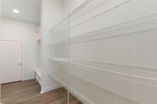 83 Heritage Manor, Cochrane, AB - Indoor With Storage