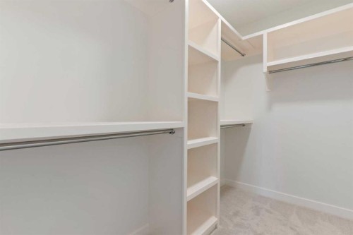 83 Heritage Manor, Cochrane, AB - Indoor With Storage