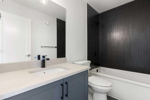 83 Heritage Manor, Cochrane, AB - Indoor Photo Showing Bathroom