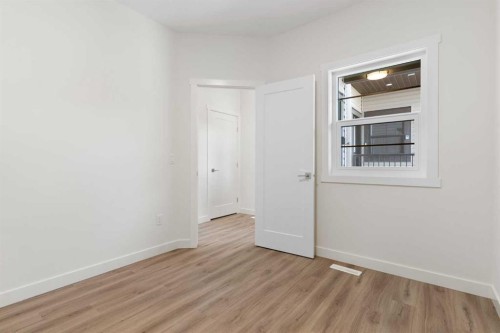 83 Heritage Manor, Cochrane, AB - Indoor Photo Showing Other Room
