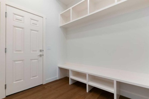 107 Heritage Manor, Cochrane, AB - Indoor Photo Showing Other Room