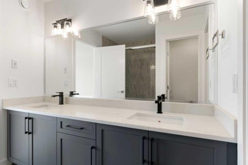 107 Heritage Manor, Cochrane, AB - Indoor Photo Showing Bathroom