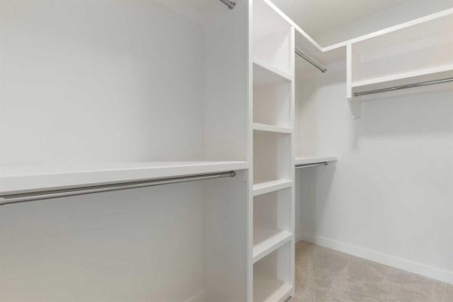 107 Heritage Manor, Cochrane, AB - Indoor With Storage