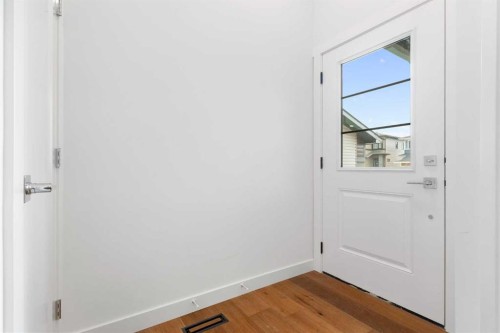107 Heritage Manor, Cochrane, AB - Indoor Photo Showing Other Room
