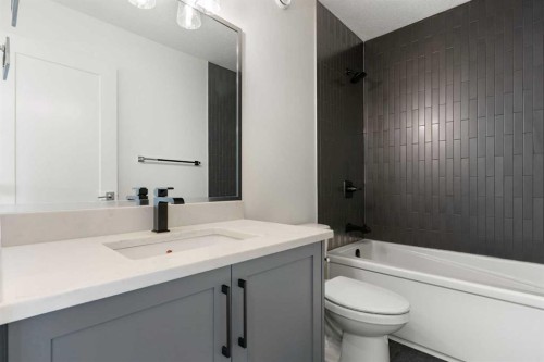 107 Heritage Manor, Cochrane, AB - Indoor Photo Showing Bathroom