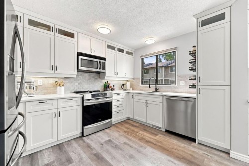 20-8533 Silver Springs Road Nw, Calgary, AB - Indoor Photo Showing Kitchen With Upgraded Kitchen