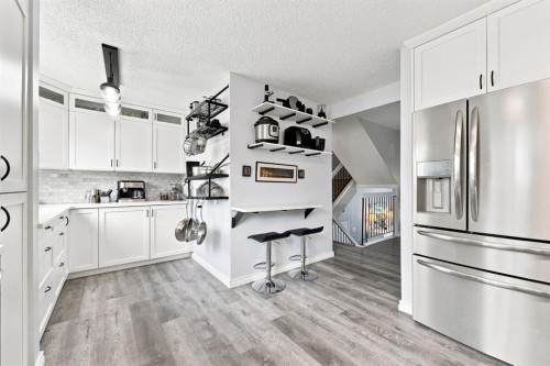 20-8533 Silver Springs Road Nw, Calgary, AB - Indoor Photo Showing Kitchen