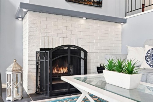 20-8533 Silver Springs Road Nw, Calgary, AB - Indoor With Fireplace
