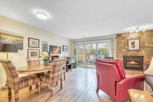 168 Midpark Gardens Se, Calgary, AB - Indoor With Fireplace