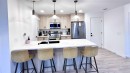 407-562 Seton Circle Se, Calgary, AB  - Indoor Photo Showing Kitchen With Upgraded Kitchen 
