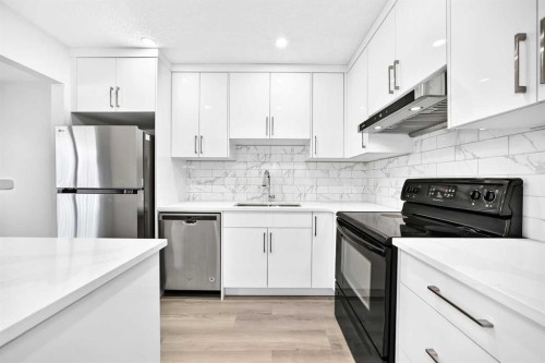 74 Fonda Drive Se, Calgary, AB - Indoor Photo Showing Kitchen With Stainless Steel Kitchen