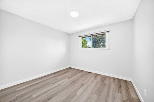 74 Fonda Drive Se, Calgary, AB - Indoor Photo Showing Other Room