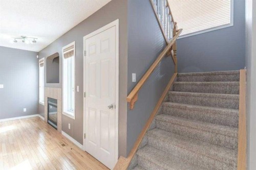 57 Royal Birch Crescent Nw, Calgary, AB - Indoor Photo Showing Other Room With Fireplace