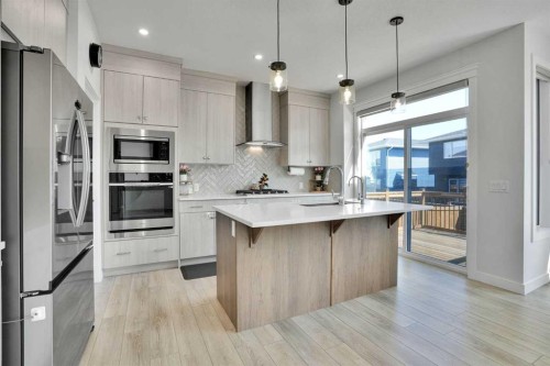 45 Dawson Gardens, Chestermere, AB - Indoor Photo Showing Kitchen With Upgraded Kitchen