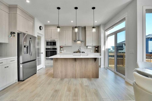 45 Dawson Gardens, Chestermere, AB - Indoor Photo Showing Kitchen With Upgraded Kitchen
