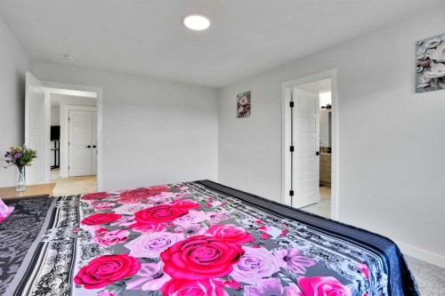 45 Dawson Gardens, Chestermere, AB - Indoor Photo Showing Bedroom
