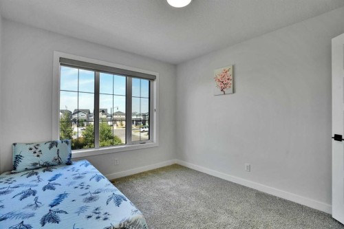 45 Dawson Gardens, Chestermere, AB - Indoor Photo Showing Bedroom