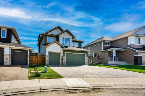 45 Dawson Gardens, Chestermere, AB - Outdoor With Facade