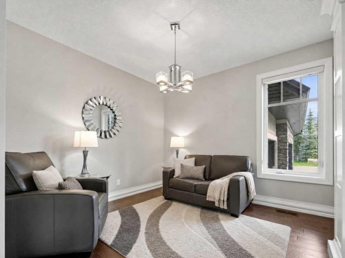 123 Aspen Summit Heath Sw, Calgary, AB - Indoor Photo Showing Living Room