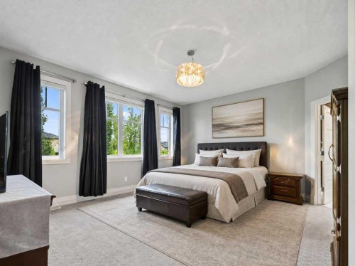 123 Aspen Summit Heath Sw, Calgary, AB - Indoor Photo Showing Bedroom