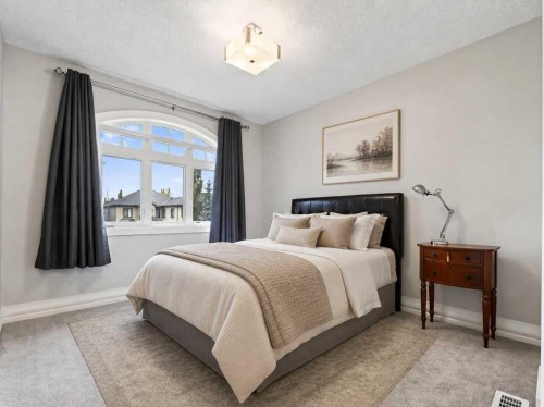 123 Aspen Summit Heath Sw, Calgary, AB - Indoor Photo Showing Bedroom