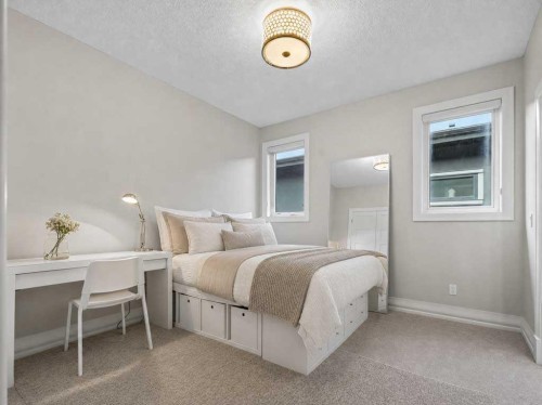 123 Aspen Summit Heath Sw, Calgary, AB - Indoor Photo Showing Bedroom
