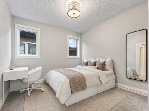 123 Aspen Summit Heath Sw, Calgary, AB - Indoor Photo Showing Bedroom