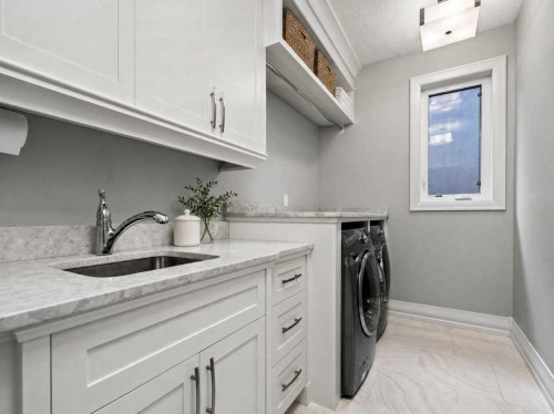 123 Aspen Summit Heath Sw, Calgary, AB - Indoor Photo Showing Laundry Room