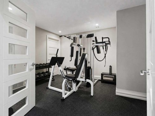 123 Aspen Summit Heath Sw, Calgary, AB - Indoor Photo Showing Gym Room