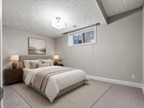 123 Aspen Summit Heath Sw, Calgary, AB - Indoor Photo Showing Bedroom
