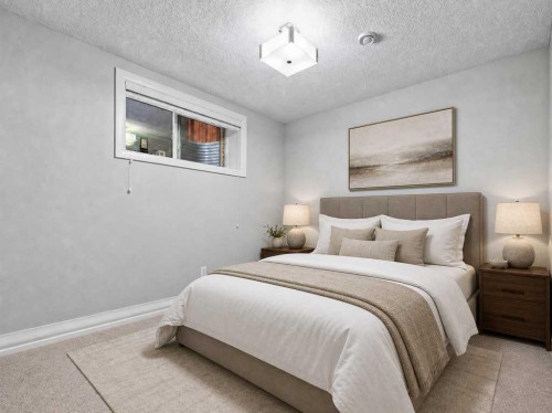 123 Aspen Summit Heath Sw, Calgary, AB - Indoor Photo Showing Bedroom