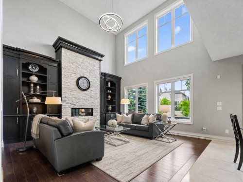 123 Aspen Summit Heath Sw, Calgary, AB - Indoor Photo Showing Other Room With Fireplace