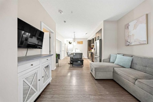 105-2231 Mahogany Boulevard Se, Calgary, AB - Indoor Photo Showing Living Room