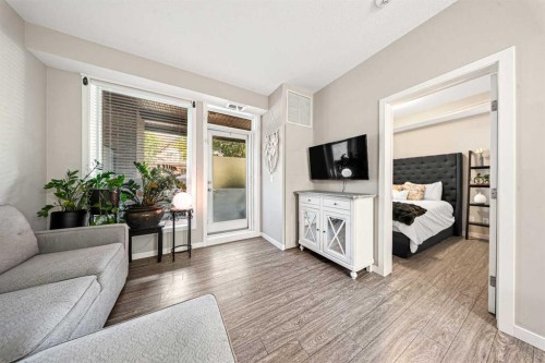 105-2231 Mahogany Boulevard Se, Calgary, AB - Indoor Photo Showing Living Room