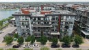 105-2231 Mahogany Boulevard Se, Calgary, AB  - Outdoor With Body Of Water 