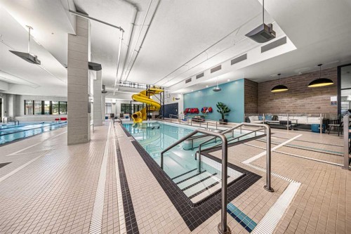 105-2231 Mahogany Boulevard Se, Calgary, AB - Indoor Photo Showing Other Room With In Ground Pool
